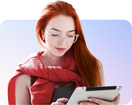 woman looking at tablet image